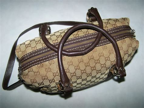 come riconoscere una borsa di gucci originale|Come riconoscere le borse Gucci originali dai falsi .